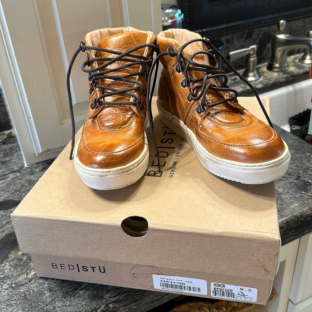 Cute booties, new!  Never worn. They are distressed